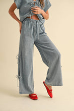Load image into Gallery viewer, DENIM TIED ON THE SIDE PANTS: MEDIUM

