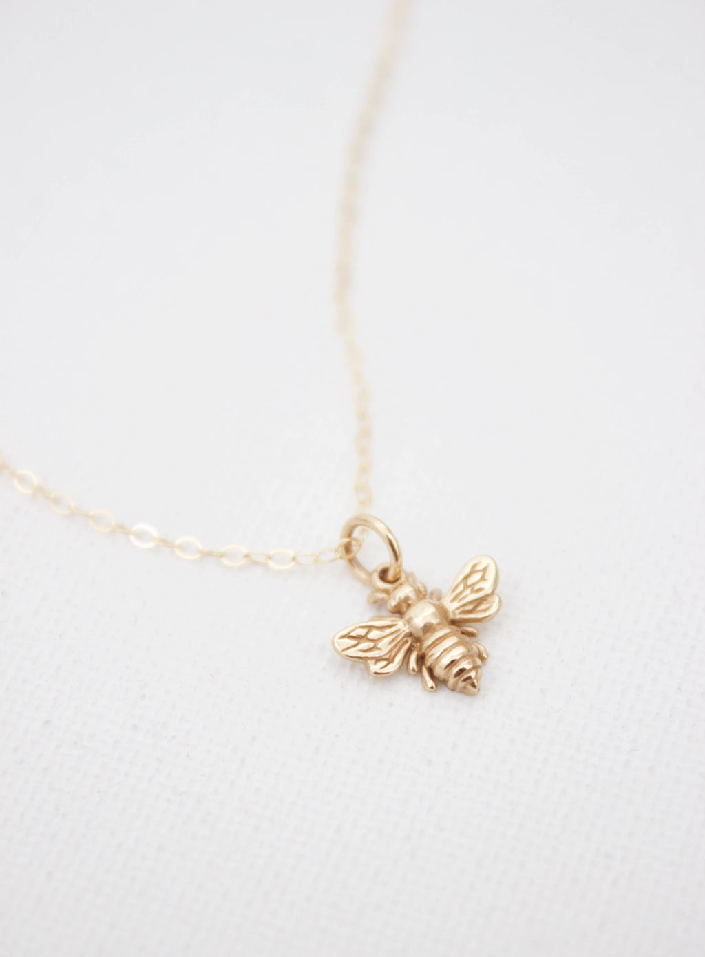 BEE CHARM NECKLACE: Gold